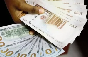 Naira gains N2.05k against dollar at official market