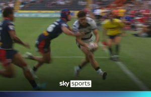 Robertson goes over advertising boards after stunning try-saving tackle!