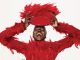 Feathers, Fruit, & a Blonde Afro: Adut Akech’s Vogue September Looks Are Unstoppable