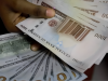 Naira gains against dollar to close week strong