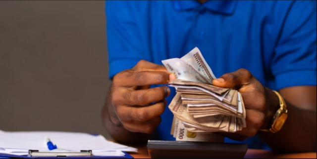 nigerian-man-counting-some-money1.png